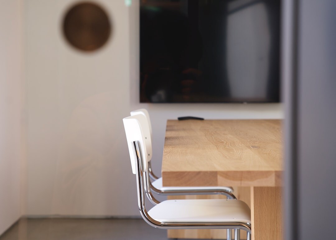 Modern empty conference room with chairs and presentation screen