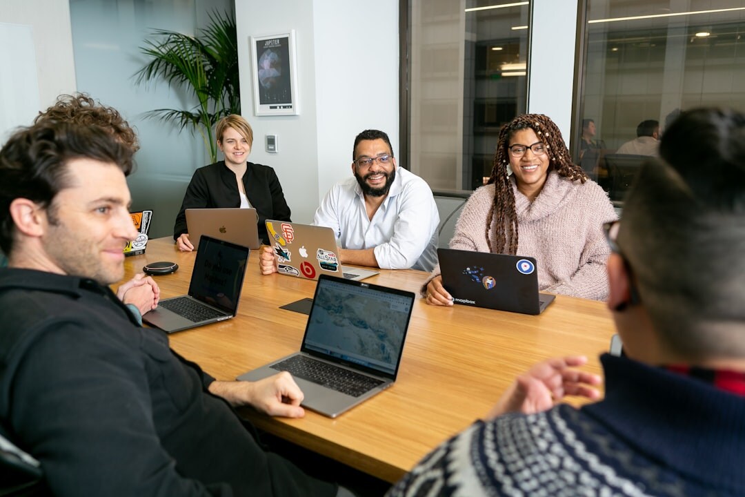 Group of professionals in a business meeting working together